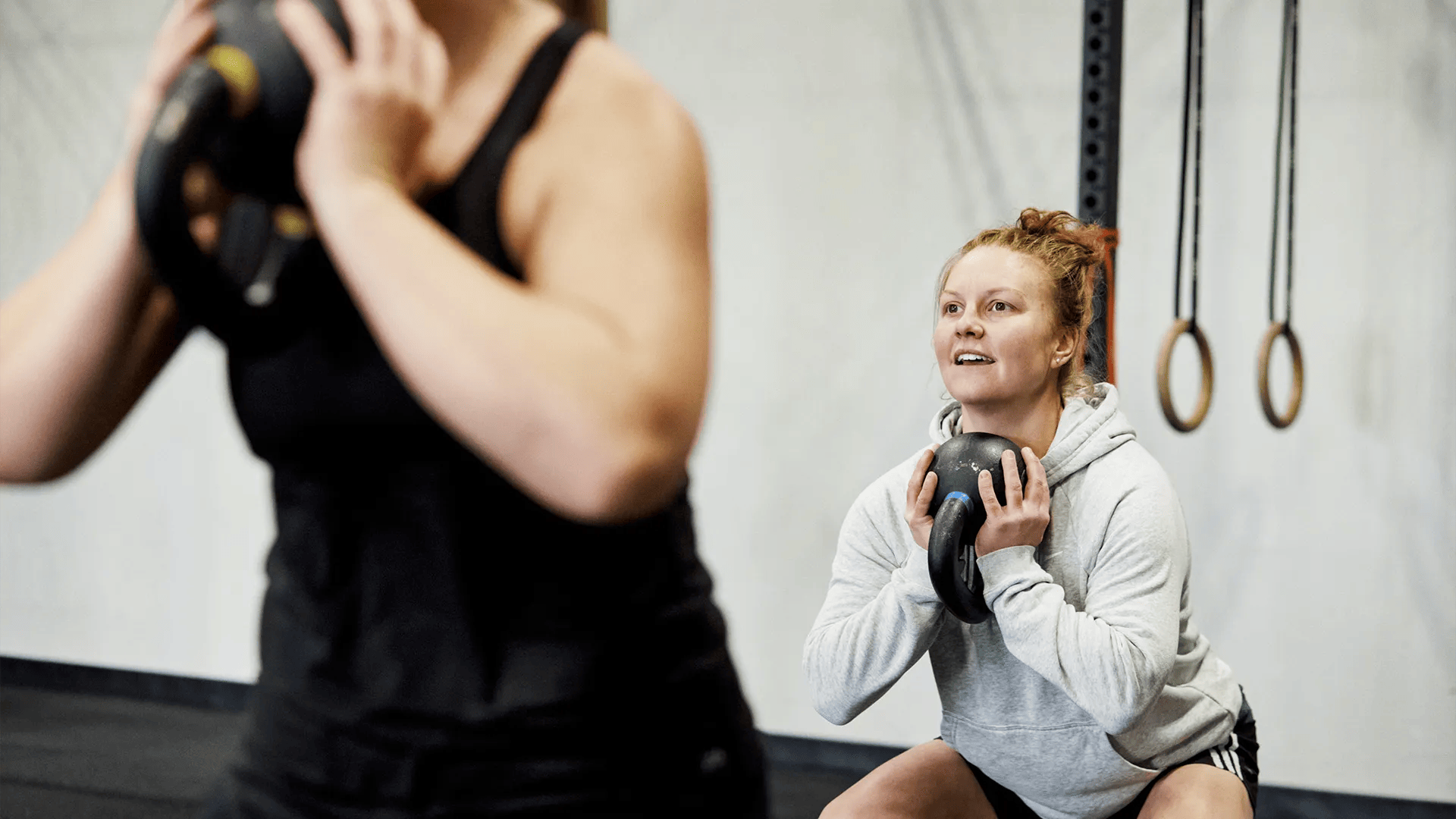 Woman training with kettlebells at CrossFit 12 Stones